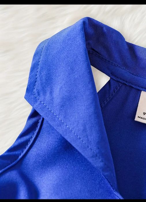 Сукня без рукавів