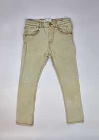 Spodnie beżowe jeansy dla chłopca rozmiar 104 Zara