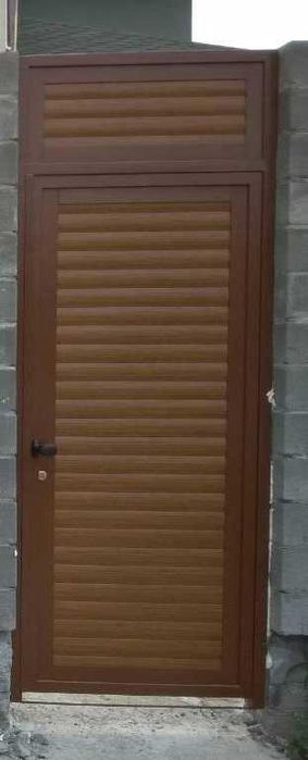 Ролеты на вьезд с калиткой для дома от компании "Элпол"