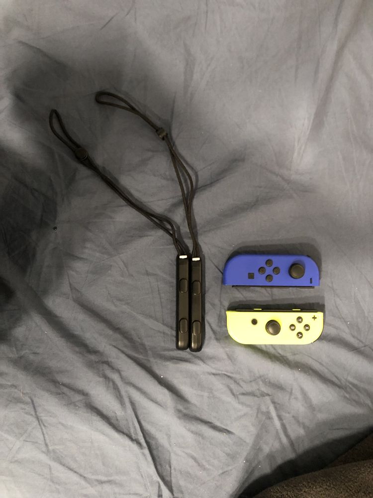 Nintendo switch + pady joycon yellow blue + 5 gier + k. Pamięci 128GB