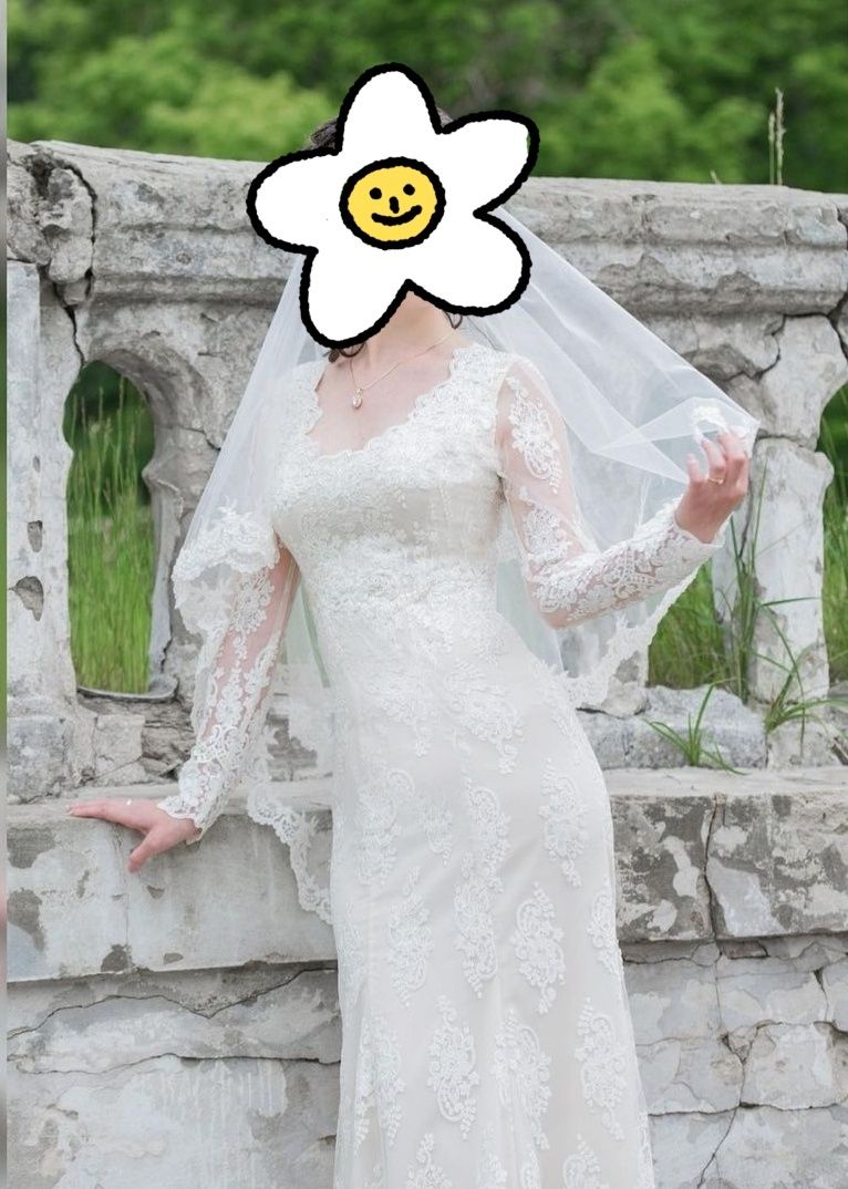 Витончена весільна сукня