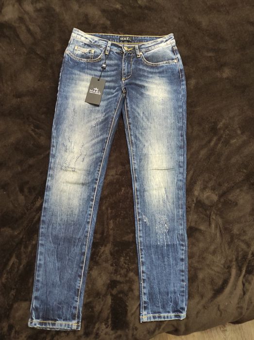 Нові класичні сині джинси розмір М