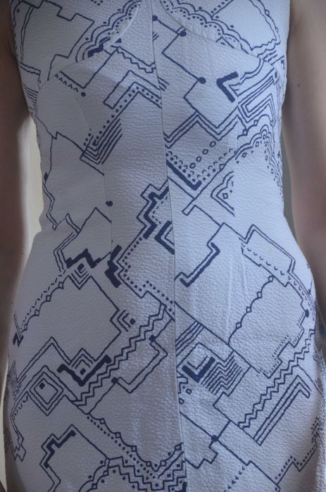 Biała krótka sukienka rozm.34