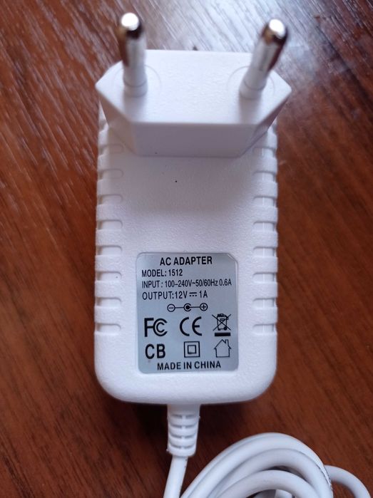 Продам адаптер, 12v  1 А.