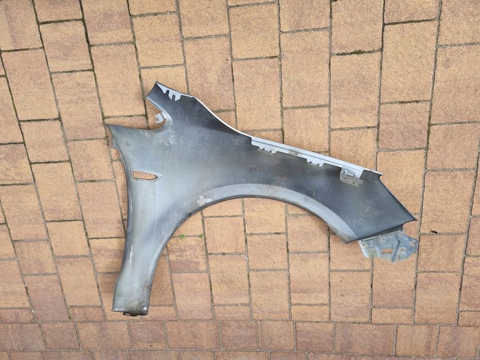 Opel astra 4 IV j 09  15 błotnik lewy przód oryginał