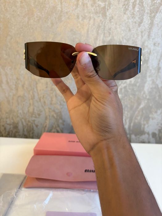 Oculos de sol miu miu