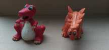 Lote de 2 Dinossauros em PVC Maia Borges