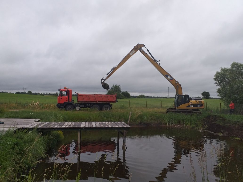 Kopanie stawów pogłebanie odmulanie koparka long nasypy drogi szutrowe