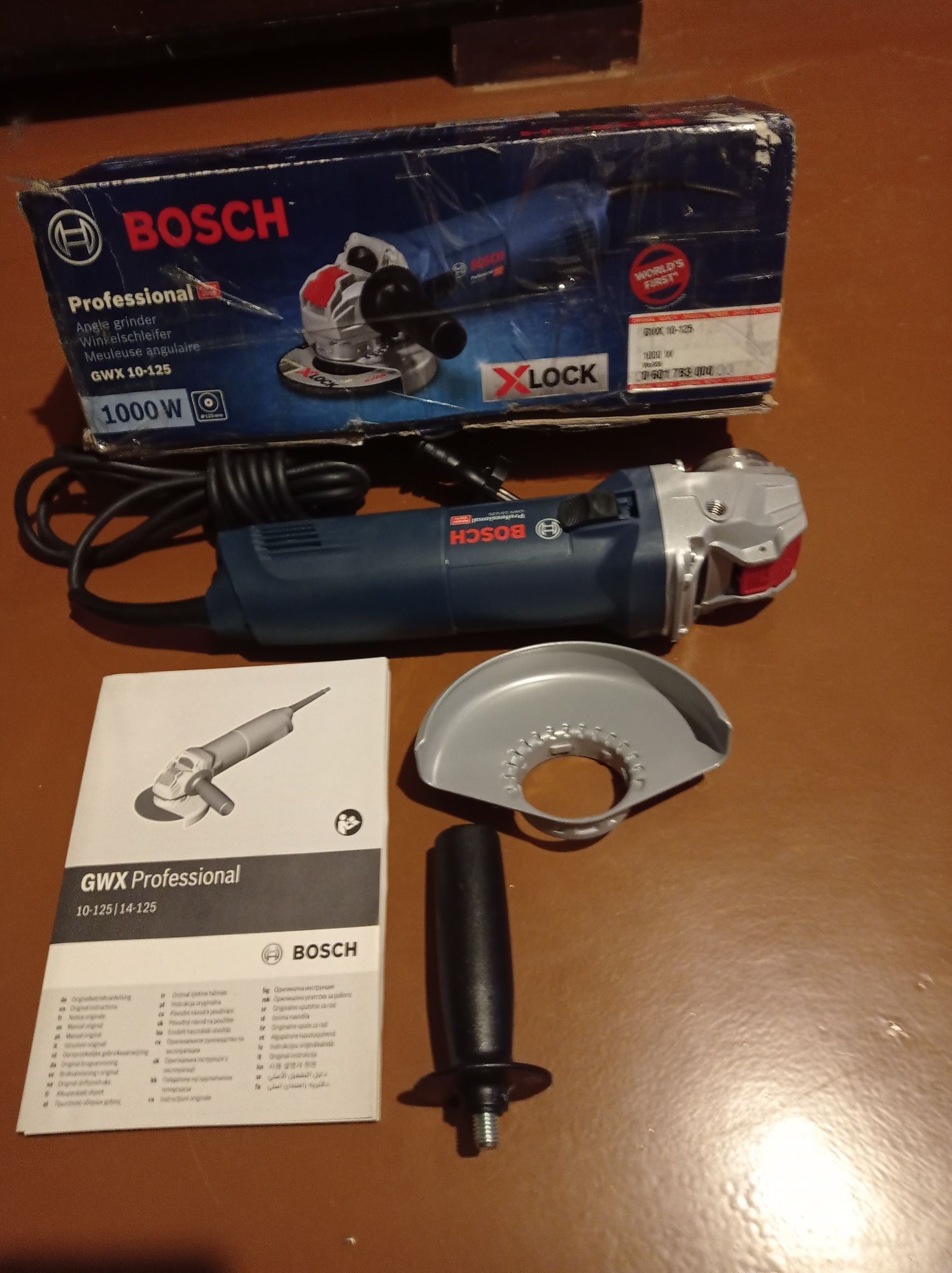 Кутова шліфувальна машина (болгарка) Bosch Professional з X-LOCK GWX 1