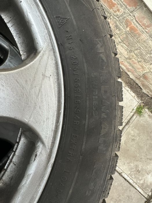 Комплект дисків Audi і зимова гума Nordman R16