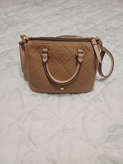 Mala, carteira nova Purificación García