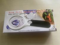 Lupa / szkło powiększające z podświetleniem