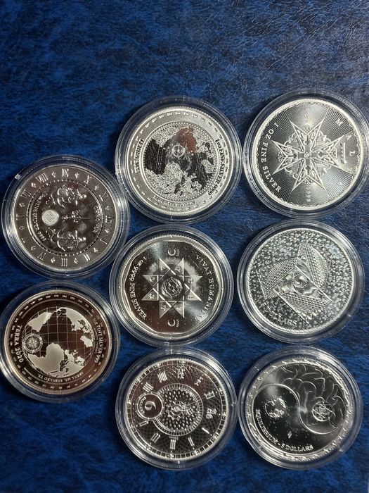 Подарок. Австралия, Британия, США, Токелау, серебро.