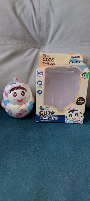 Неваляшка з рухливим обличчам