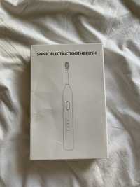 Ультразвукова електрична зубна щітка