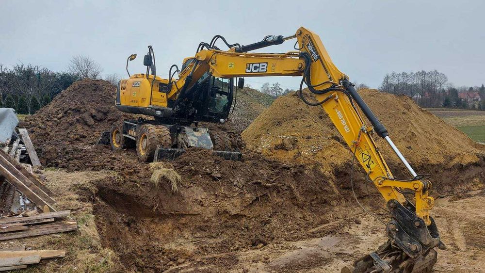 Roboty ziemne Giebułtów Kraków koparka obrotowa 17T kołowa JCB JS145W