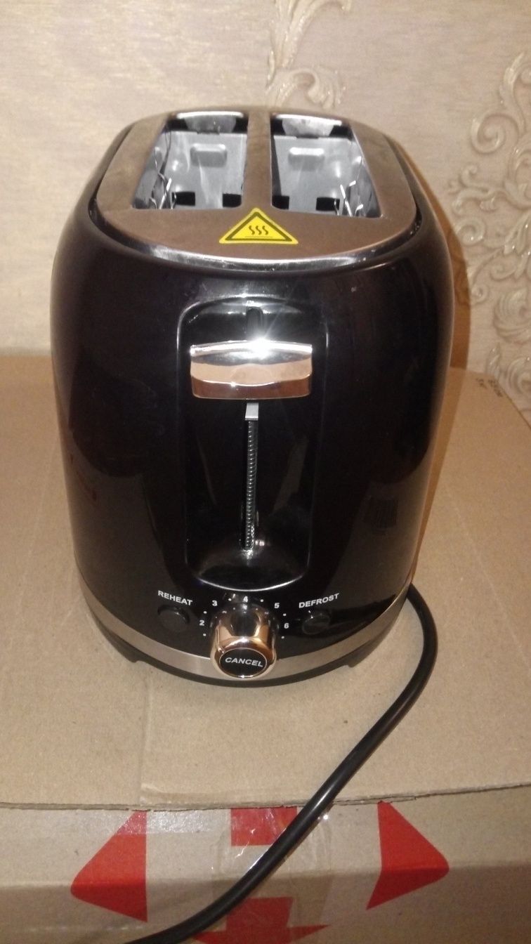 Тостер ROTEX RTM150-B