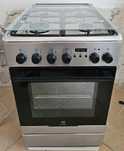 Kuchnia gazowo-elektryczna Electrolux  EKK54554OX