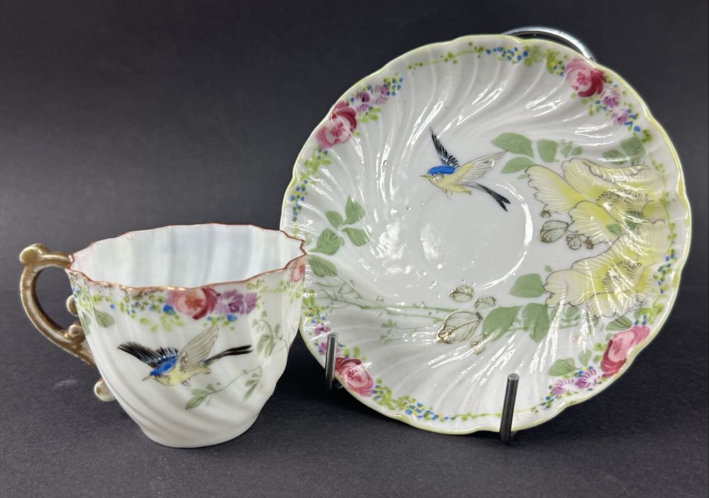 Filiżanka ze spodkiem ptak cieniutka porcelana filiżanki kwiaty