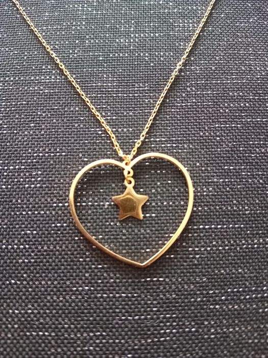 Naszyjnik dłuższy serce z gwiazdką.