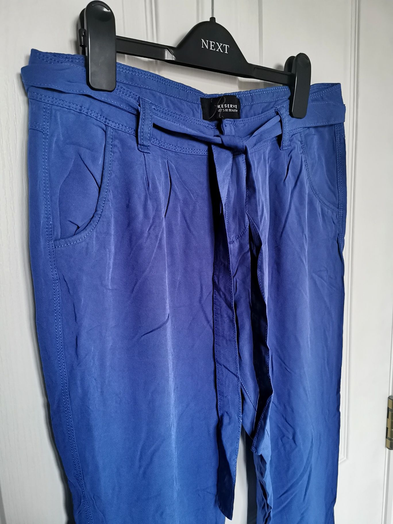 Niebieskie, chabrowe spodnie Reserved, rozmiar 36