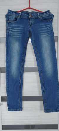 Spodnie jeansowe dżinsowe dziny rurki biodrowki xs ckh