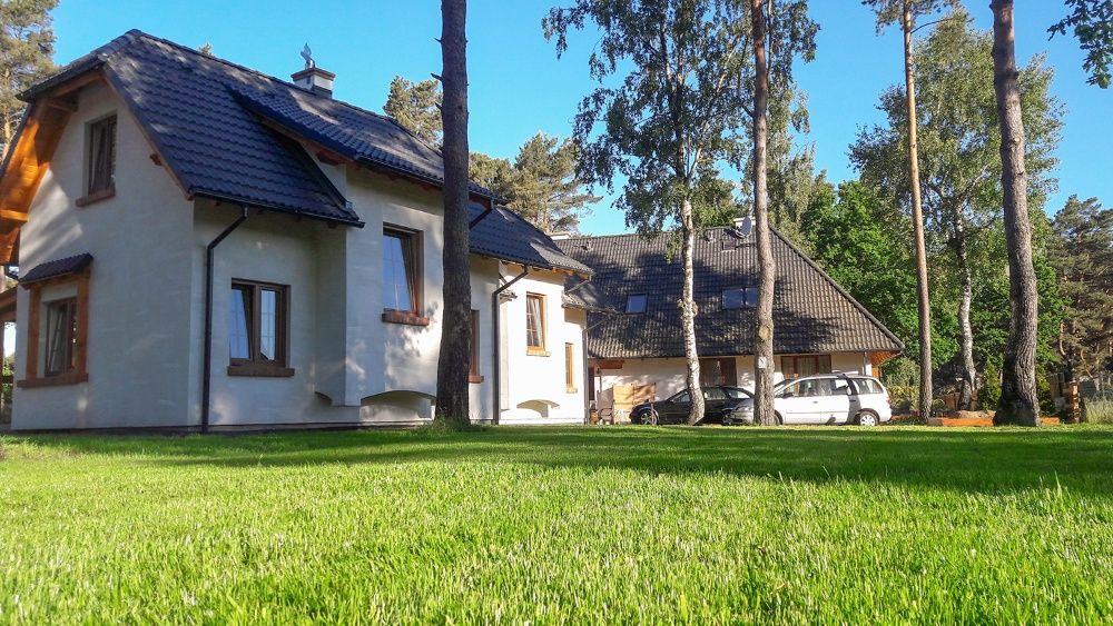 Domki nad morzem jacuzzi wakacje morze Jarosławiec plaża Dubaj las