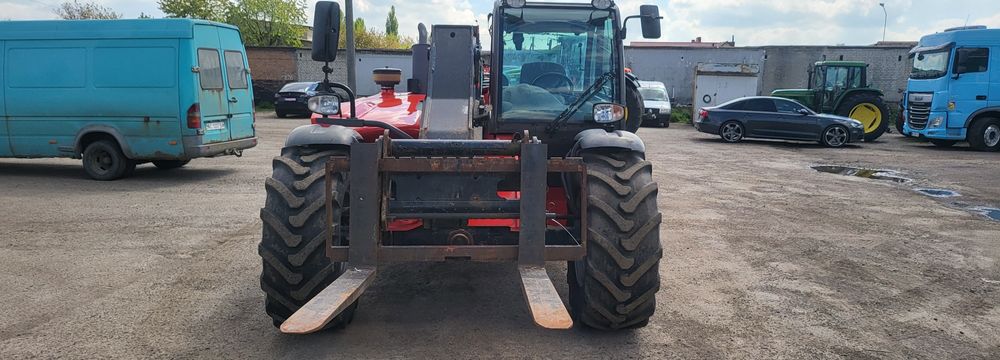Телескопічний навантажувач маніту manitou