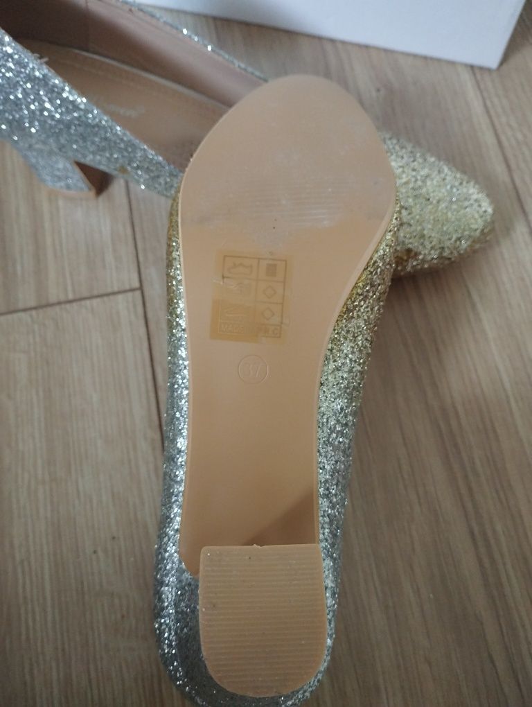 Nowe buty damskie czółenka srebrno złote na słupku