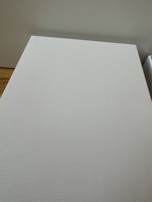 Dwa białe kartonowe prostokątne pudełka do przechowywania