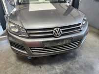 VW TOUAREG II 7P 10-14R ZDERZAK KOMPLETNY PRZOD LAMPY MASKA BŁOTNIK CHŁODNICE GRILL KOMPLET