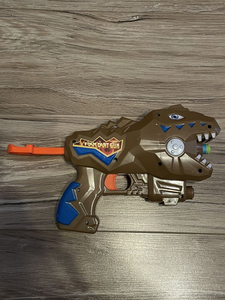 Zabawkowy pistolet dino z nabojem