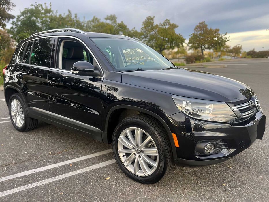Volkswagen Tiguan      2014