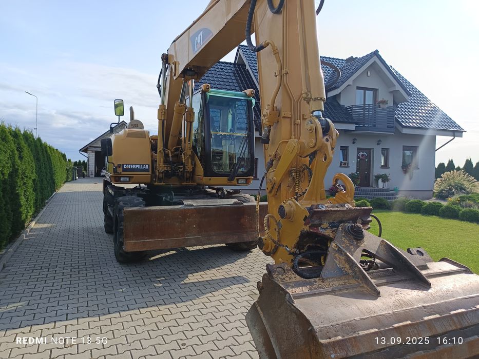 Koparka kołowa CAT 313C