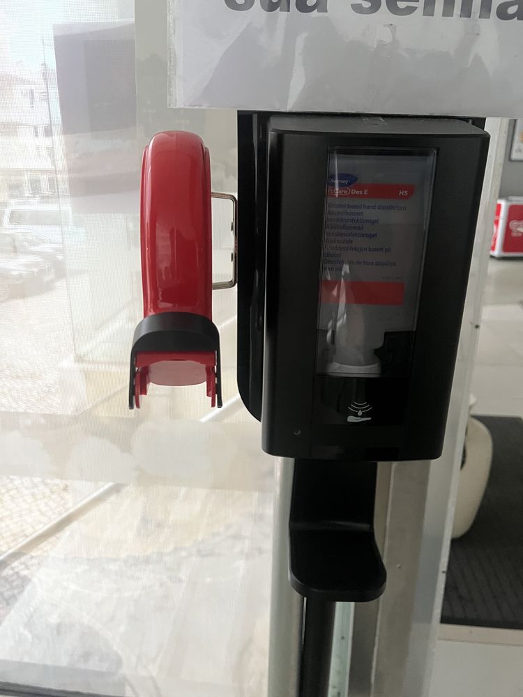 Maquina de senhas e desinfetante