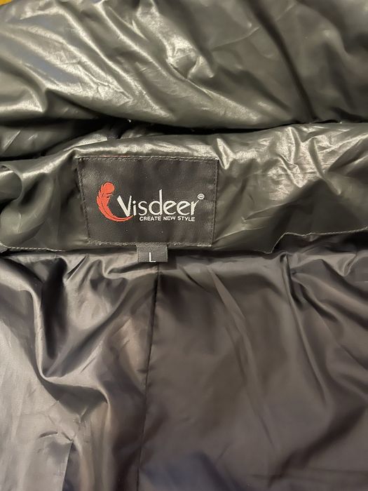 Продам пуховик в гарному стані