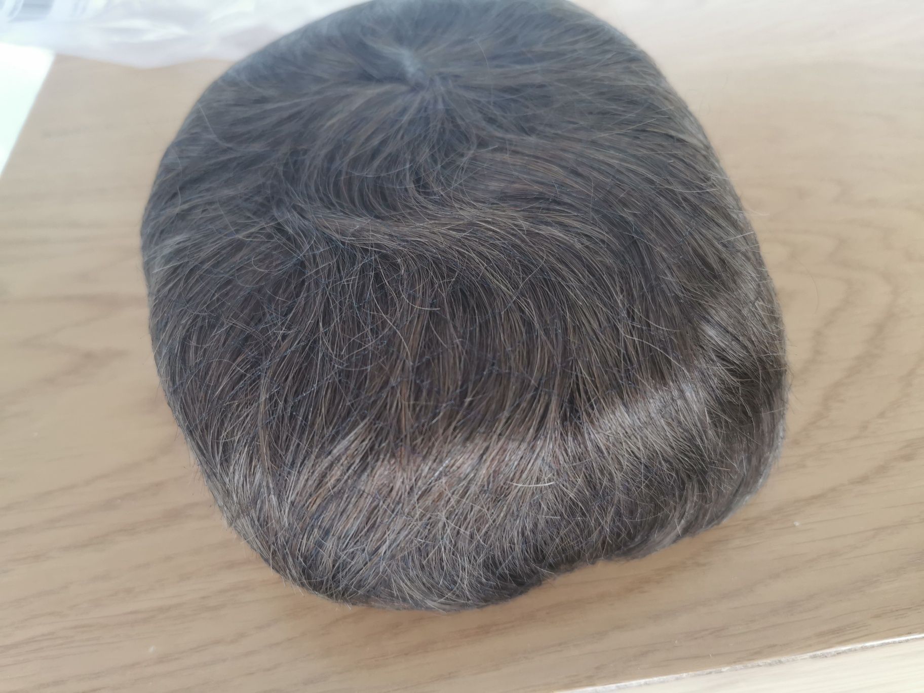 prótese capilar masculina feita de cabelo humano