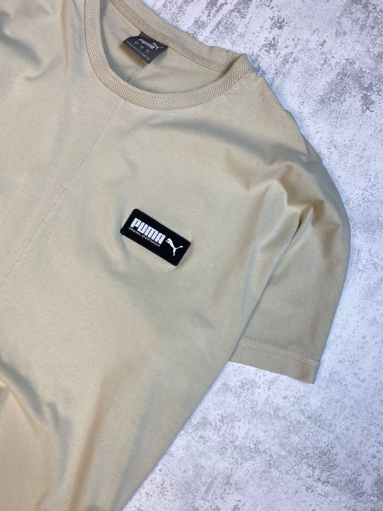 Бежева футболка PUMA Fusion Tee у мінімалістичному стилі