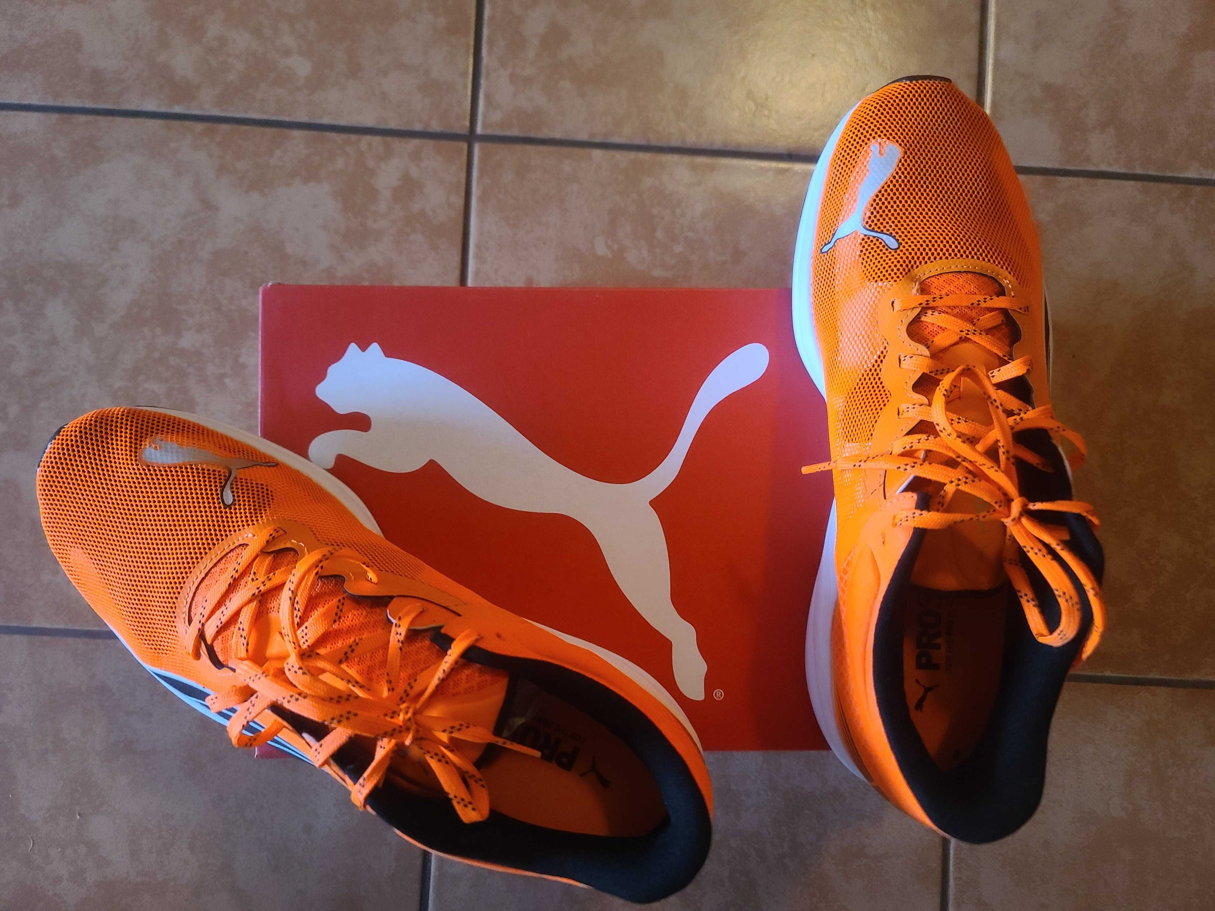 Кросівки чоловічі демісезонні Puma Redeem Profoam р.44,5 оранжеві біг