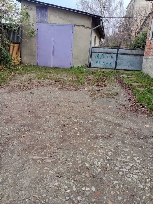 Продам 1/2 частину будинку із ділянкою , гаражем біля Турецького моста