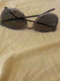 Óculos de sol lentes polarizadas usados