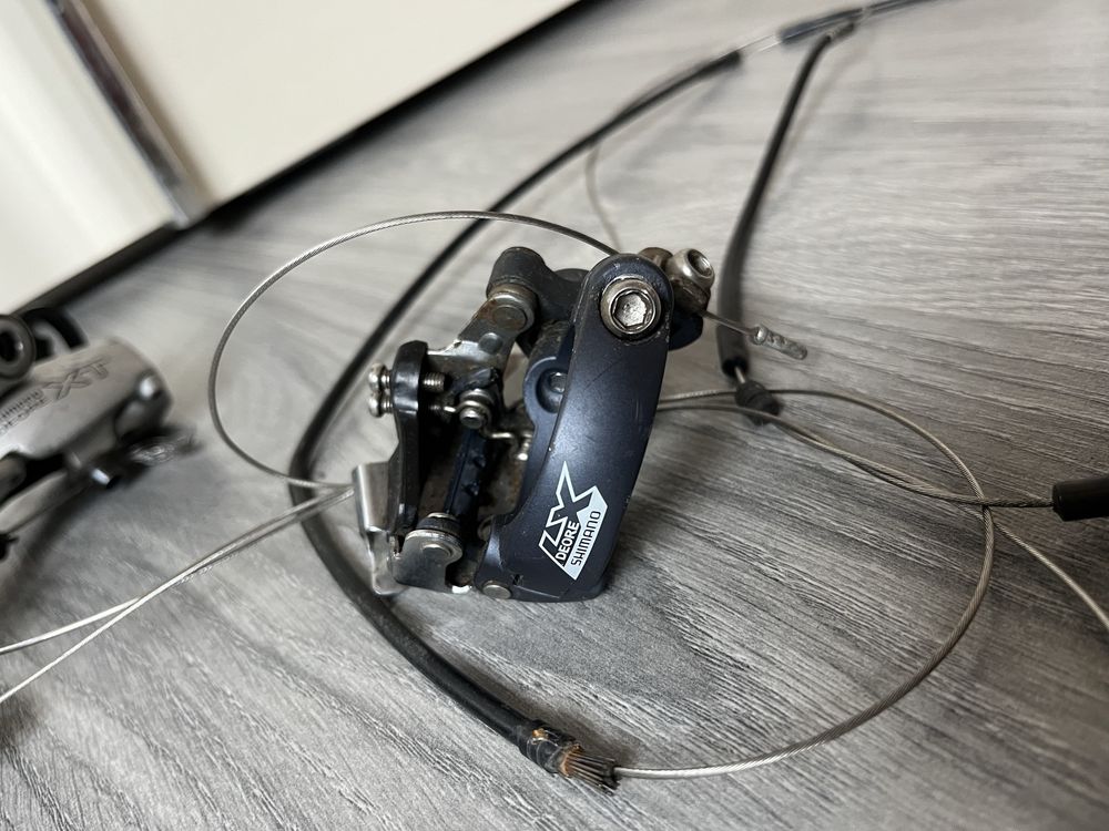 Перекидки і перемикачі Shimano Deore