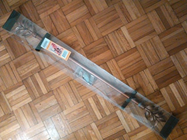 Varão cortinado de cor bronze