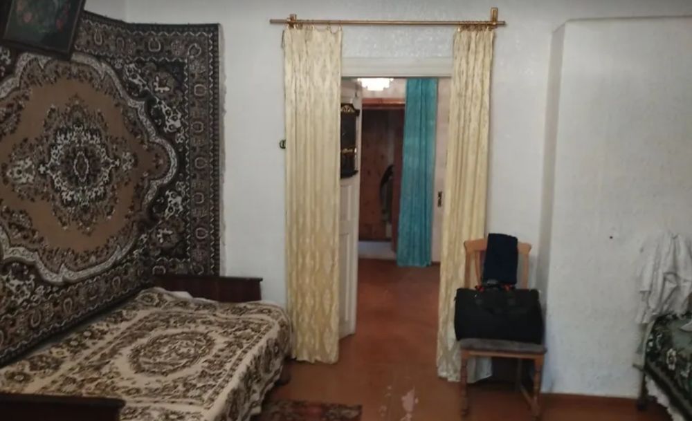 "1/2 частина будинку   з ділянкою і гаражем