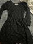 Vestido preto.
