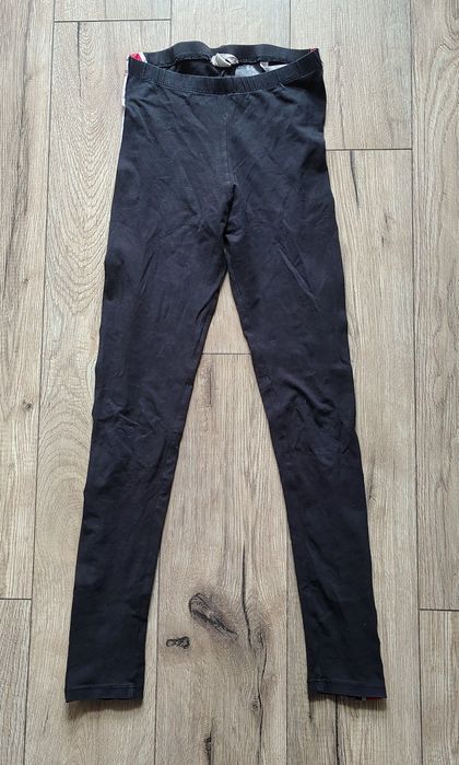 Spodnie legginsy dziewczęce czarne z paskami H&M 152