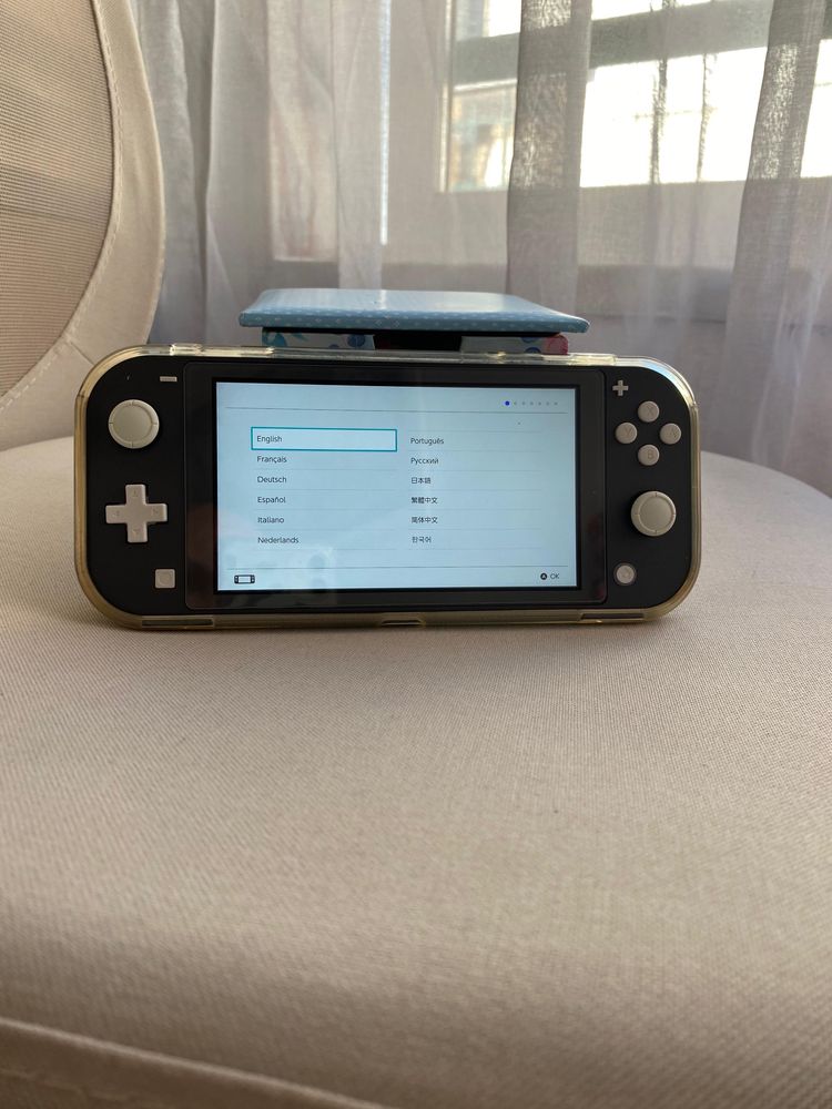 Nintendo switch lite + 3 jogos