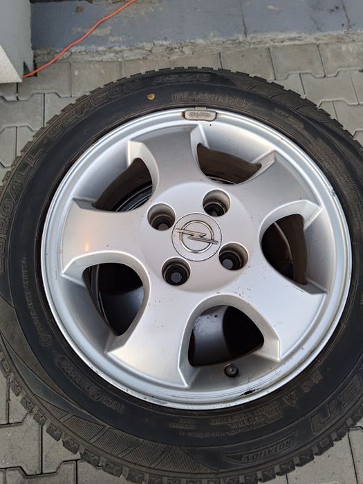 Koła Opel 14" | Aluminiowe felgi GM + opony wielosezonowe | Bytom