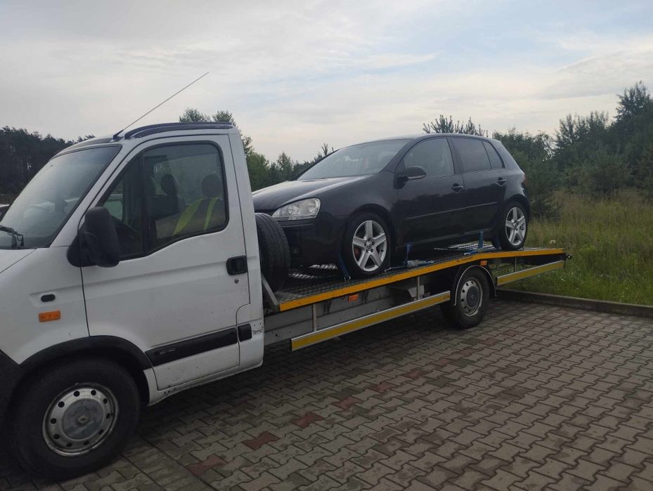 Autolaweta Laweta Pomoc drogowa transport samochodów osobowych maszyn