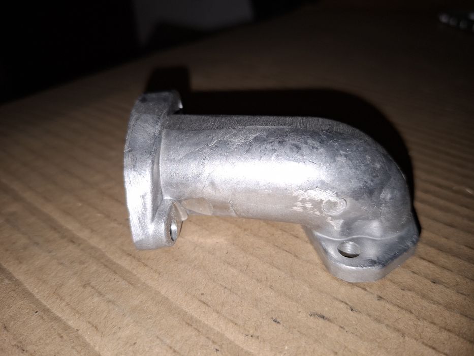 Kruciec kolektor gaznika silnika romet ogar 200,jawa 50 mustang kaczka